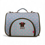 Load image into Gallery viewer, Pet carrier with pink polka dots and visible brand logo on a white background
