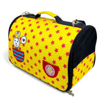 Load image into Gallery viewer, Yellow pet carrier with pink star pattern, cartoon rabbit design, and red patch on a white background
