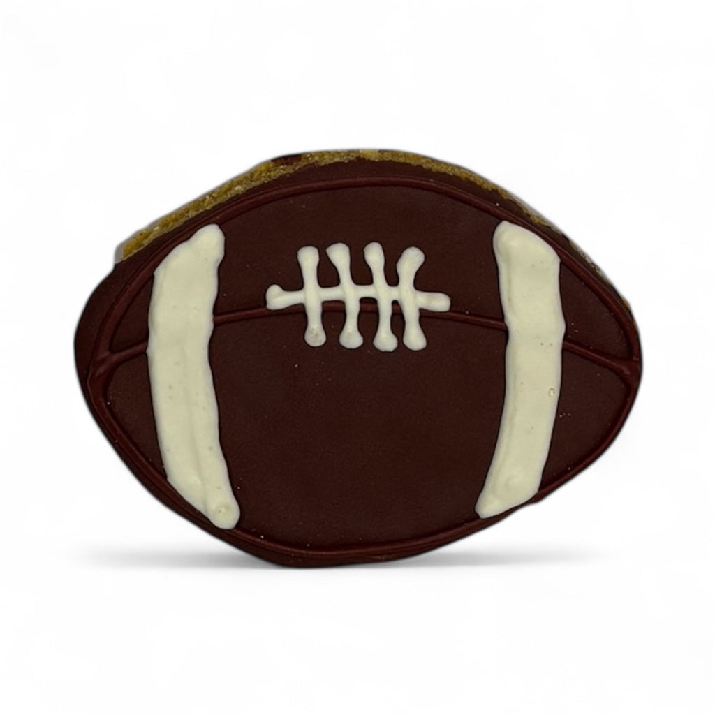 Football shaped dog cookie