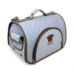 Load image into Gallery viewer, Pet carrier with pink polka dots and brown accents on a white background
