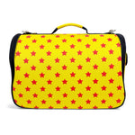Load image into Gallery viewer, Yellow bag with red star pattern on a white background

