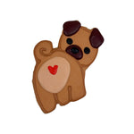 Load image into Gallery viewer, A Pug Shaped Dog cookie or with tan and brown icing, dark brown ears and nose, black eyes, and a small red heart on the back, shown on a plain white background.
