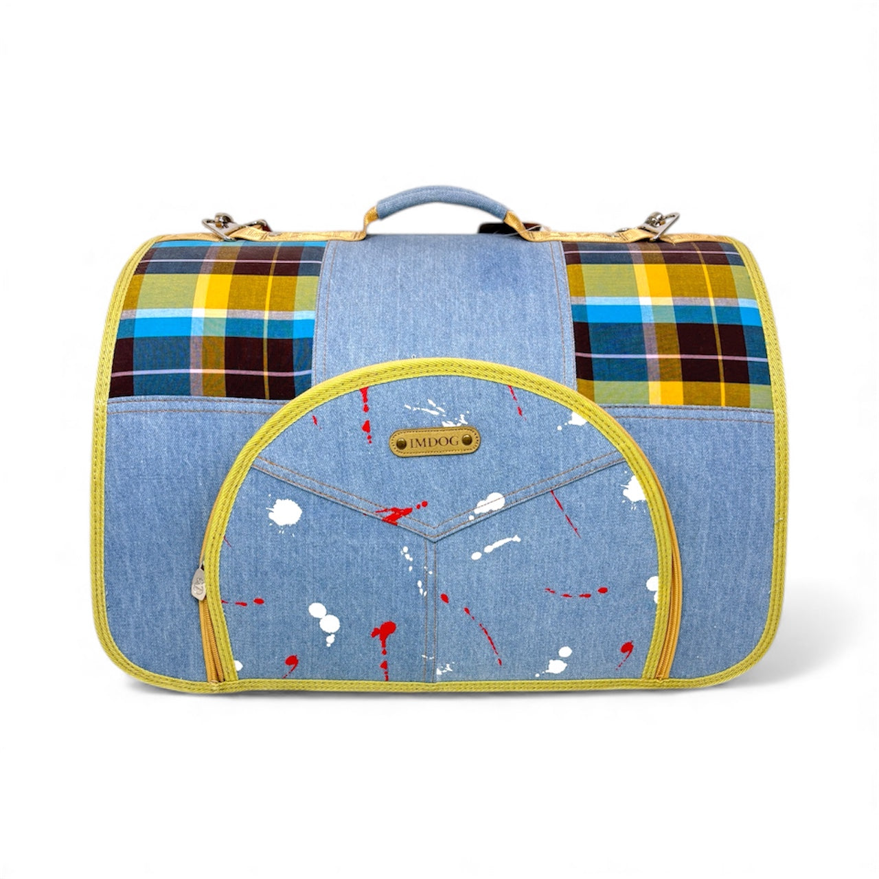 Multicolored plaid and denim pet carrier on a white background